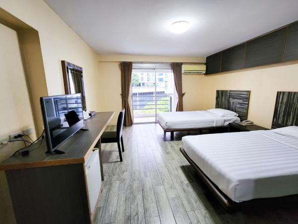 Watana Hotel : photo 5 de la chambre chambre lits jumeaux deluxe