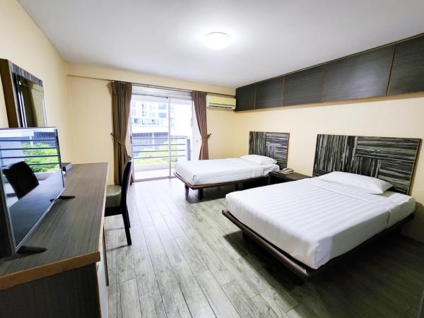 Watana Hotel : photo 6 de la chambre chambre lits jumeaux deluxe
