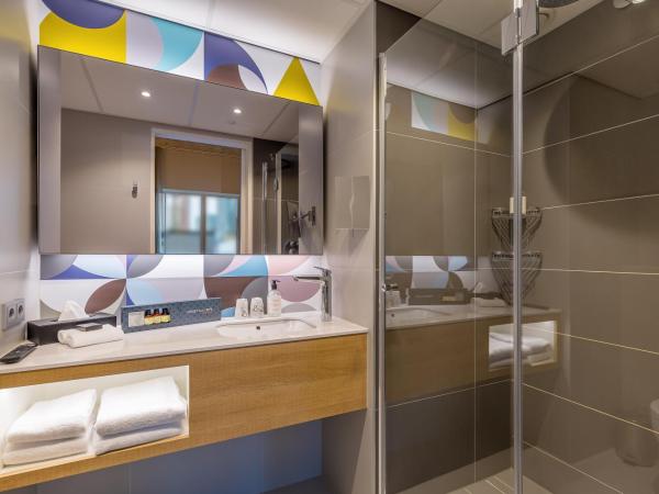 Postillion Hotel WTC Rotterdam : photo 1 de la chambre chambre lit king-size standard