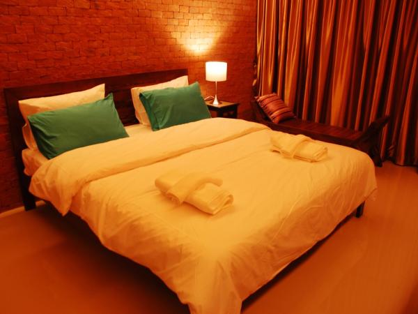 The White Elephant Home : photo 6 de la chambre chambre lit king-size avec balcon