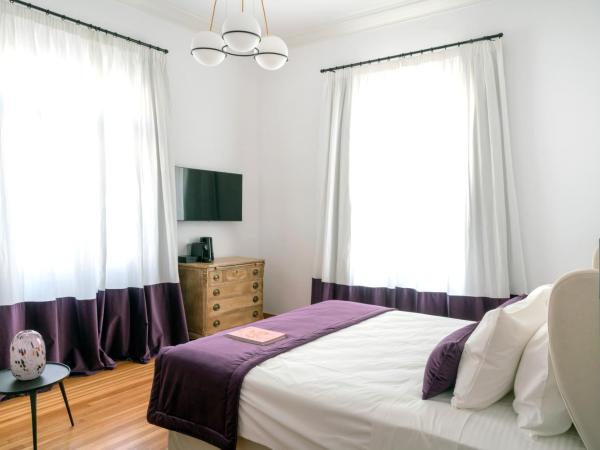 Athens Flair : photo 6 de la chambre suite signature avec bain à remous extérieur