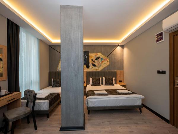 Comfort Point : photo 2 de la chambre chambre triple deluxe