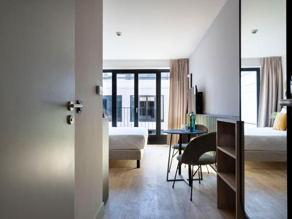 numa I Arc Rooms & Apartments : photo 7 de la chambre suite