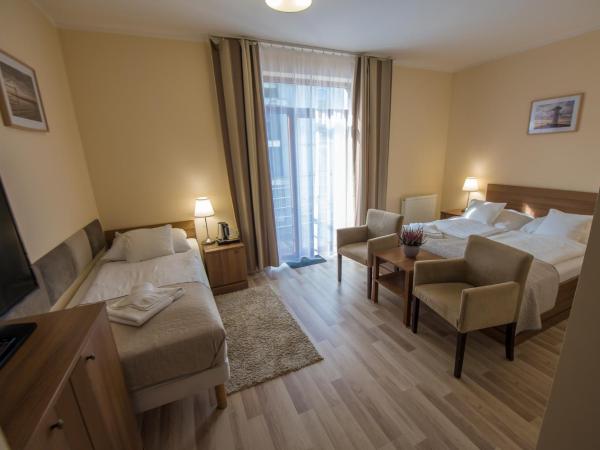 Rezydencja Familia : photo 2 de la chambre chambre triple classique