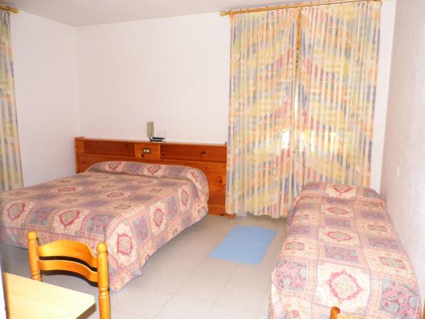 Hotel Mochettaz : photo 1 de la chambre chambre triple