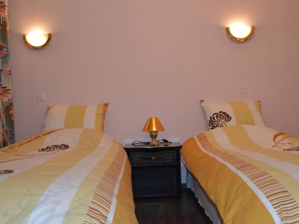 Hôtel Timgad : photo 1 de la chambre chambre lit jumeaux - accès par escalier uniquement