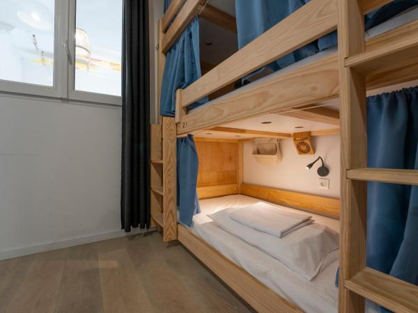 GARDEN - Utopy Hostel : photo 4 de la chambre lit simple en dortoir