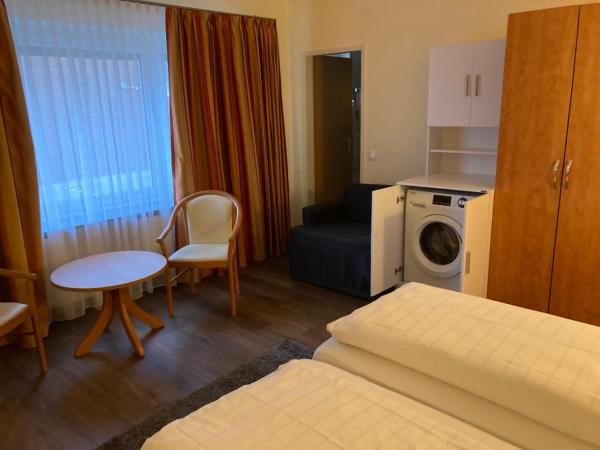 Hotel Falk : photo 3 de la chambre appartement - rez-de-chaussée