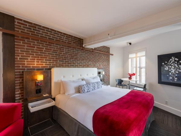 Hôtel des Coutellier : photo 1 de la chambre suite lit king-size