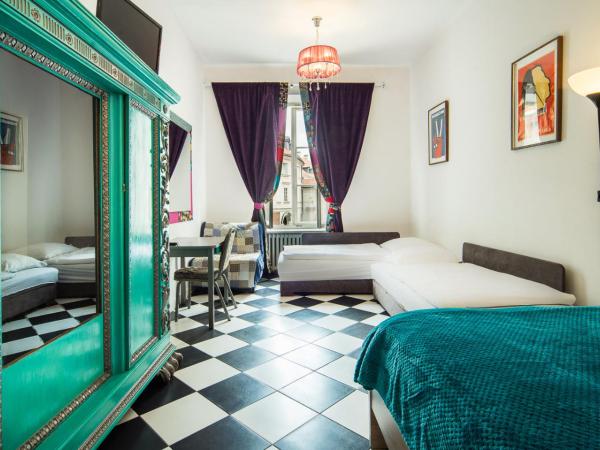 Old Town Kanonia Hostel & Apartments : photo 4 de la chambre chambre quadruple