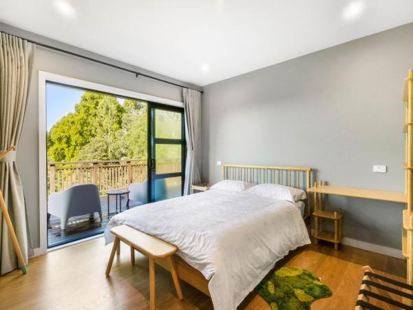 Echo Lodge : photo 7 de la chambre chambre lit queen-size avec balcon