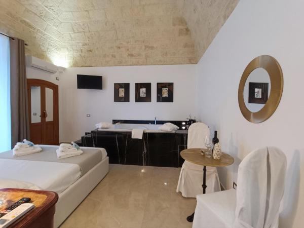 Ventidue Venti : photo 5 de la chambre chambre lit queen-size avec baignoire spa