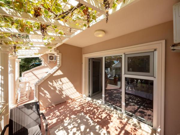 Melis Hotel Kusadasi : photo 10 de la chambre chambre double - vue sur jardin - annexe