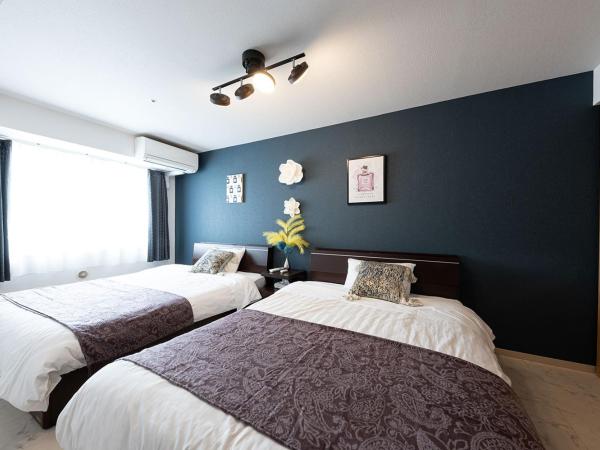 AMS TOWER : photo 4 de la chambre suite - vue sur jardin