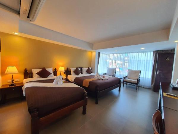 Goldenbell Hotel Chiangmai : photo 2 de la chambre chambre triple deluxe