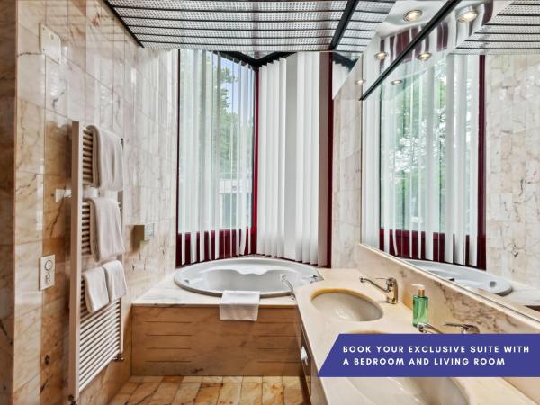 becozy Au Parc Retro Edition Self-Check-In Rooms & Studios Fribourg : photo 1 de la chambre suite deluxe