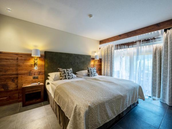 Romantik Hotel Schweizerhof : photo 1 de la chambre suite 1 chambre supérieure - vue sur eiger