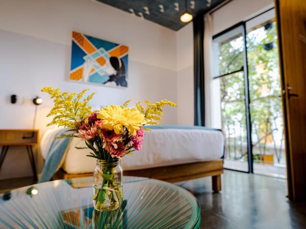 Hotel con Corazón : photo 2 de la chambre chambre lit queen-size