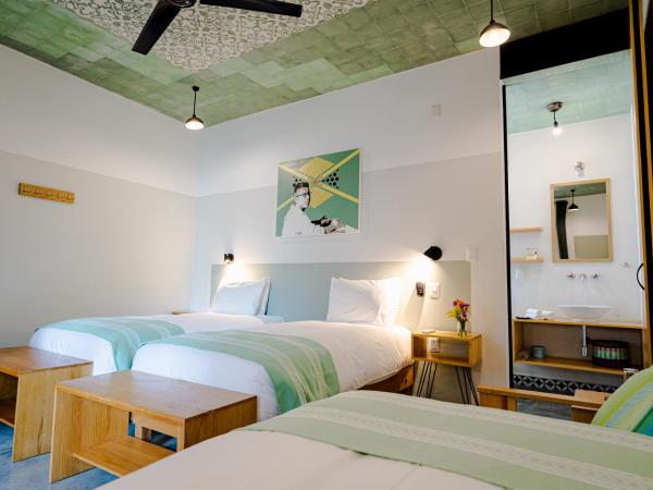 Hotel con Corazón : photo 1 de la chambre chambre lit king-size avec lit d'appoint