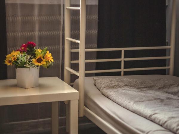 4 Couples & 4 Friends Hostel : photo 3 de la chambre chambre quadruple