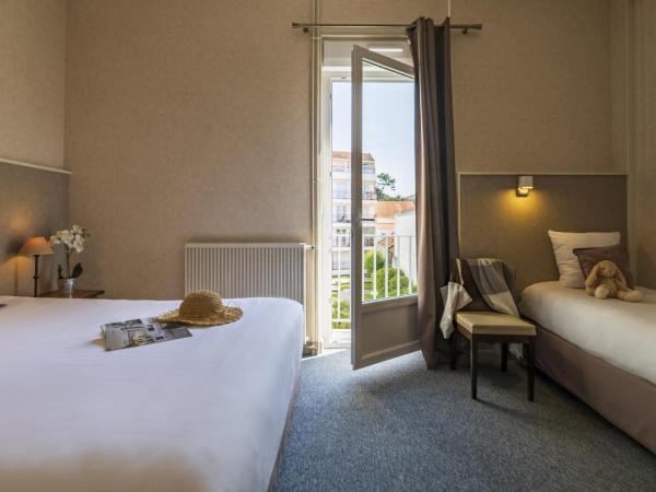 CERISE Royan - Le Grand Hôtel de la Plage : photo 7 de la chambre chambre double ou lits jumeaux - vue sur ville