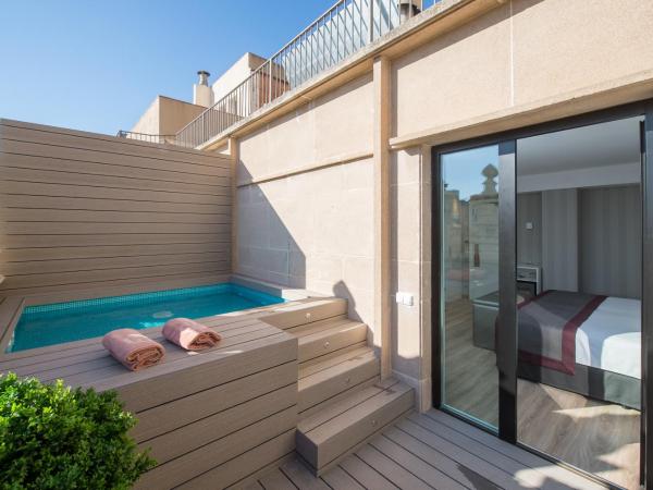 Catalonia Plaza Catalunya : photo 1 de la chambre chambre double ou lits jumeaux supérieure avec accès piscine et spa 