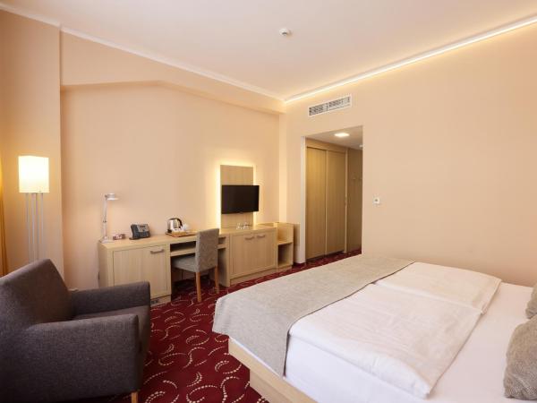 Amarilis : photo 4 de la chambre chambre deluxe double ou lits jumeaux