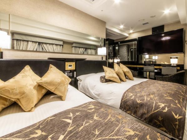 APA Hotel Kobe Sannomiya Ekimae : photo 1 de la chambre chambre lits jumeaux deluxe