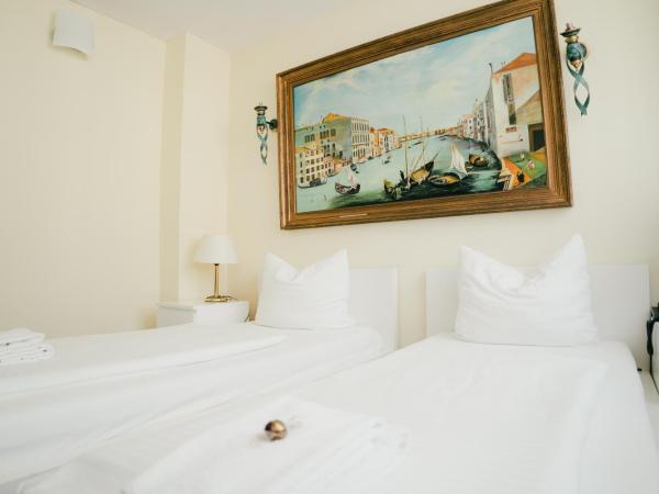 Altstadt Hotel St. Georg : photo 3 de la chambre chambre lits jumeaux