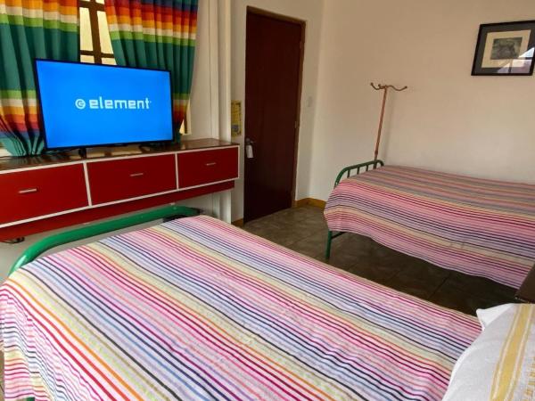 Hostal Mixteco Naba Nandoo : photo 1 de la chambre chambre lits jumeaux standard avec salle de bains commune