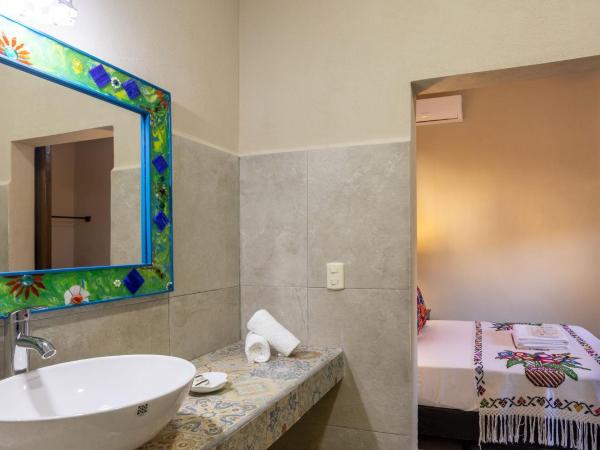 Casa del Solar Centro Cozumel - Wifi gratuito Fibra Óptica 200 Mbps : photo 1 de la chambre chambre lit queen-size