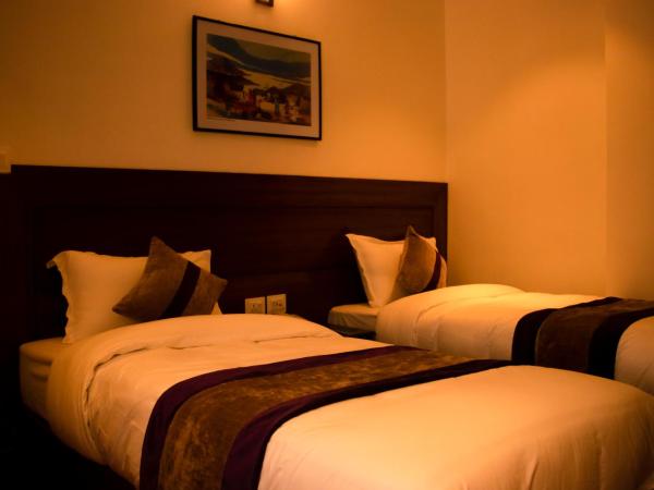 Hotel New Era : photo 5 de la chambre chambre lits jumeaux Économique