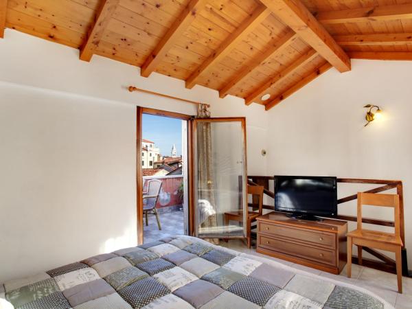 Locanda Delle Acque : photo 3 de la chambre chambre quadruple avec terrasse - vue sur canal