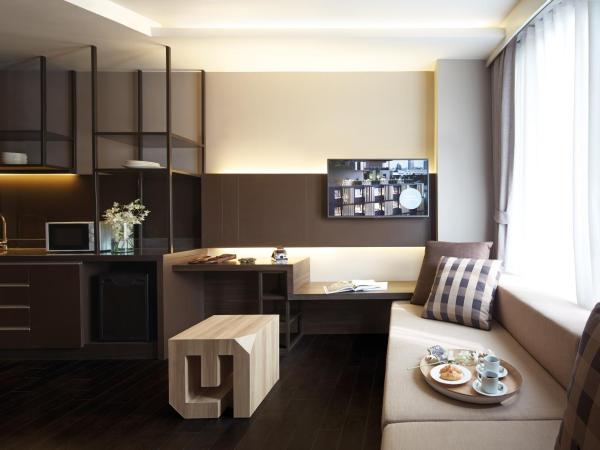 Happy 3 : photo 3 de la chambre suite deluxe avec lit king-size