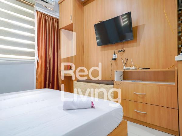 RedLiving Apartemen Green Pramuka - Aokla Property Tower Orchid : photo 2 de la chambre studio