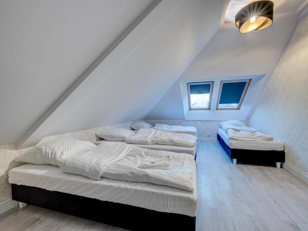 Dworek Kurowski : photo 4 de la chambre chambre familiale deluxe