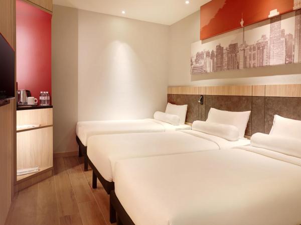 ibis Kuala Lumpur City Centre : photo 2 de la chambre chambre standard avec 3 lits simples sans fenêtre