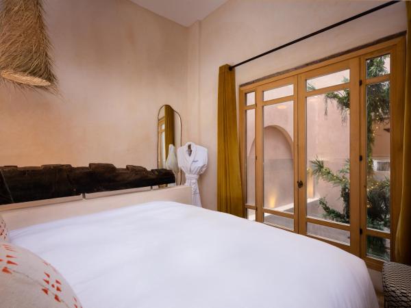 Mama Lova : photo 6 de la chambre chambre triple deluxe