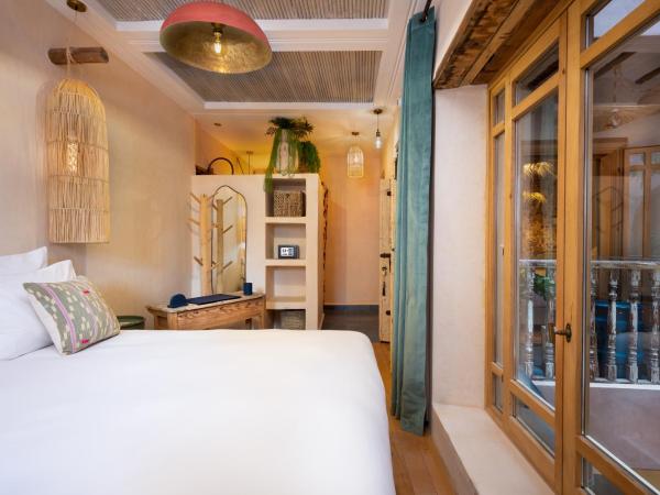 Mama Lova : photo 4 de la chambre chambre quadruple de luxe