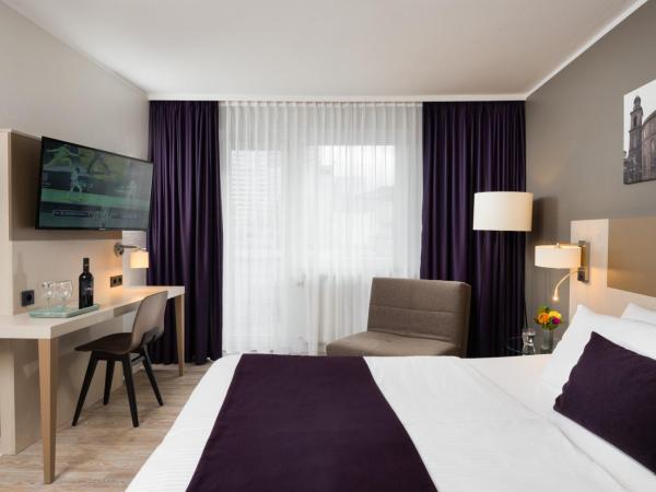 Leonardo Hotel Frankfurt City Center : photo 2 de la chambre chambre double ou lits jumeaux confort