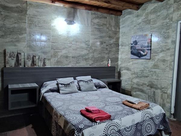 Hostel Ruca Potu : photo 3 de la chambre chambre quadruple avec salle de bains privative