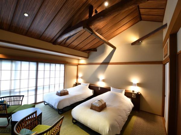 Yasaka Yutone Kyokoyado : photo 1 de la chambre chambre lits jumeaux - « gunjyou »