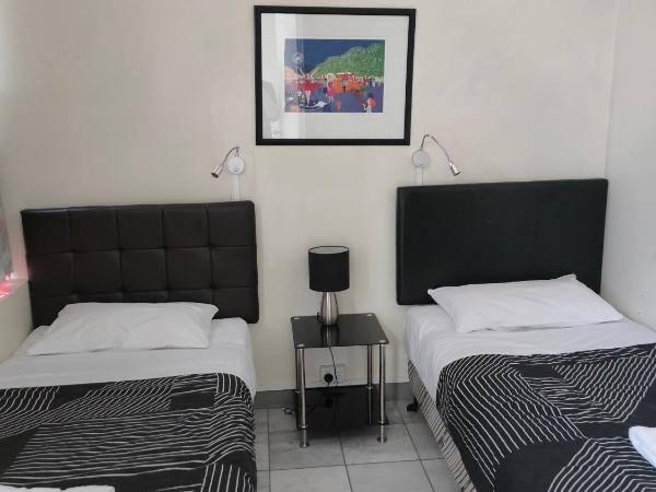 Harringtons102 : photo 7 de la chambre suite familiale