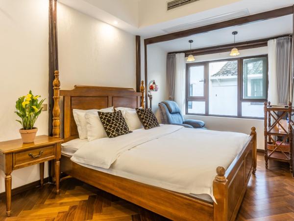 Tongli 1917 Best South Inn : photo 1 de la chambre fate garden view room