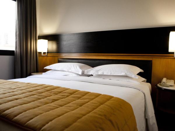 Estanplaza International : photo 2 de la chambre suite supérieure