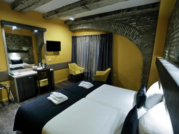 City Hotel Amsterdam : photo 10 de la chambre chambre lits jumeaux en sous-sol