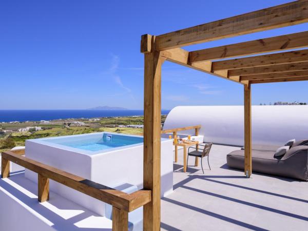 Este Luxury Suites : photo 9 de la chambre suite Élite avec bain à remous - vue sur mer