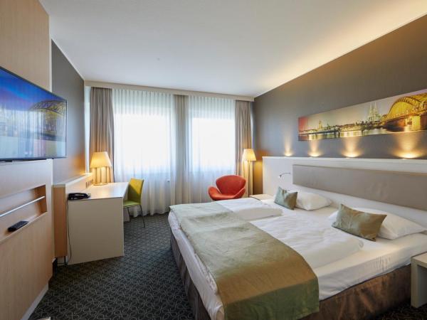 Mercure Hotel Severinshof Köln City : photo 2 de la chambre chambre supérieure lit queen-size