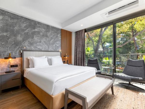 Unique Life Style Hotel : photo 1 de la chambre chambre triple - vue sur jardin