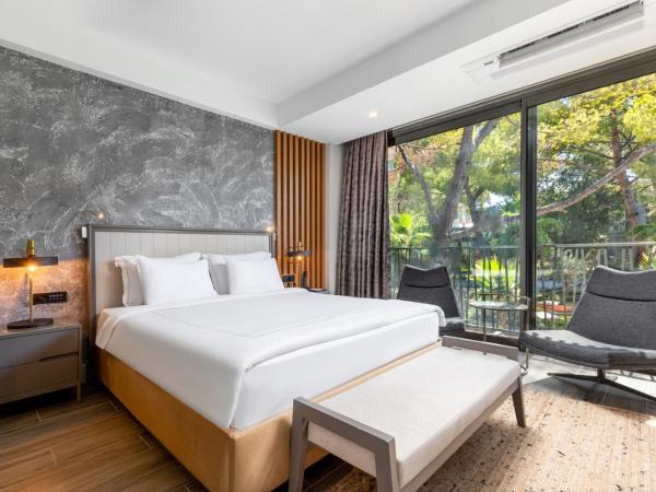 Unique Life Style Hotel : photo 6 de la chambre chambre triple - vue sur jardin